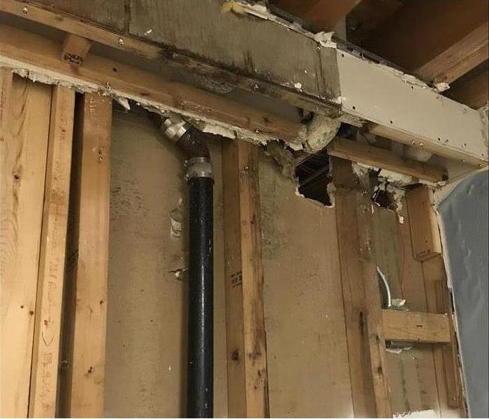 Damage caused by an unnoticed pipe leak in a commercial office
