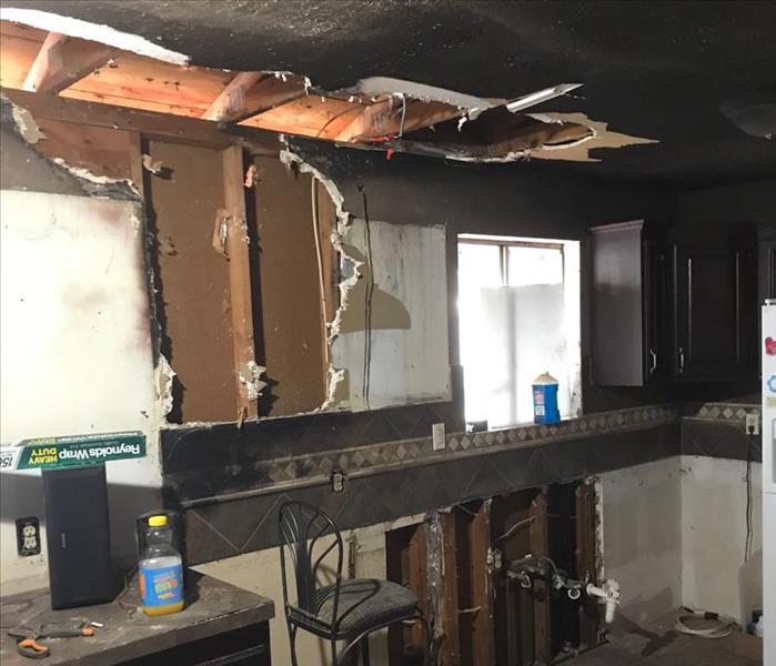 Burned ceiling and cabinets in Cedar City home