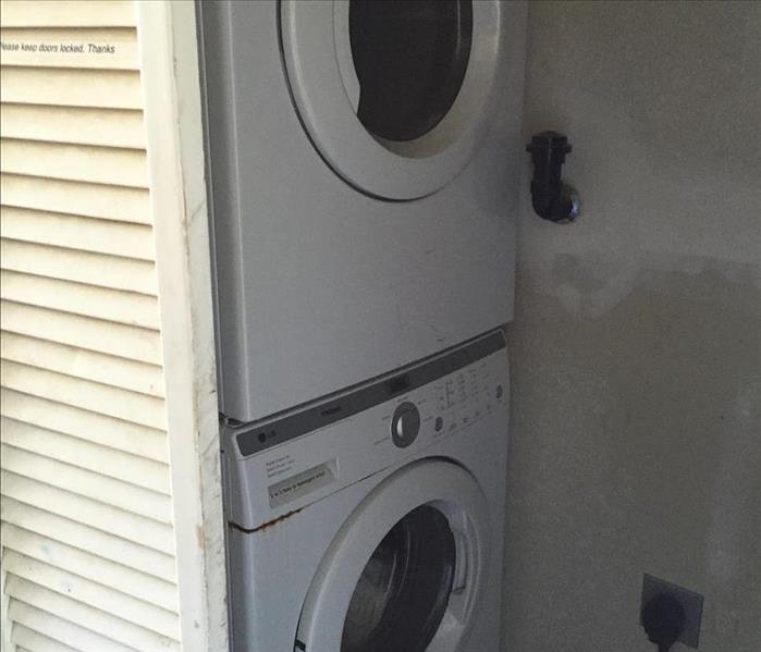 Dryer stacked on top of a washer in a Cedar City Home